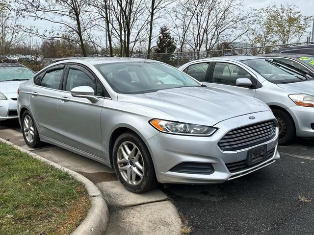 used 2014 Ford Fusion car, priced at $8,000