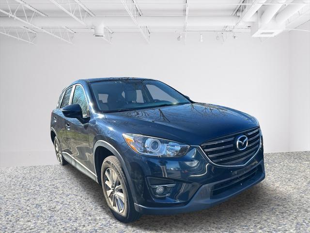 used 2016 Mazda CX-5 car, priced at $14,000