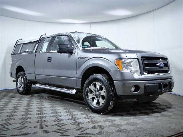 used 2013 Ford F-150 car, priced at $15,000