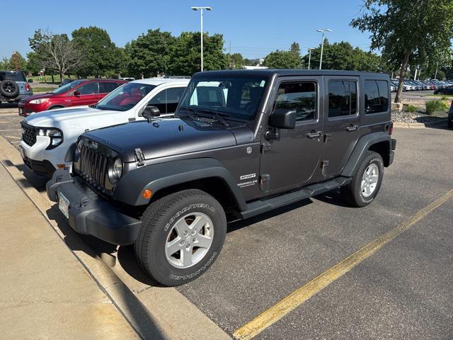 used 2014 Jeep Wrangler Unlimited car, priced at $13,999