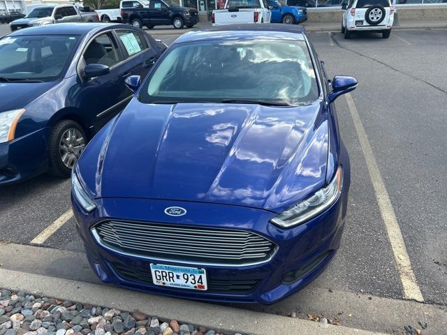 used 2014 Ford Fusion car, priced at $10,000