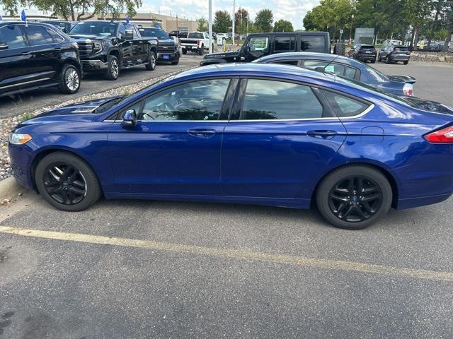 used 2014 Ford Fusion car, priced at $10,000
