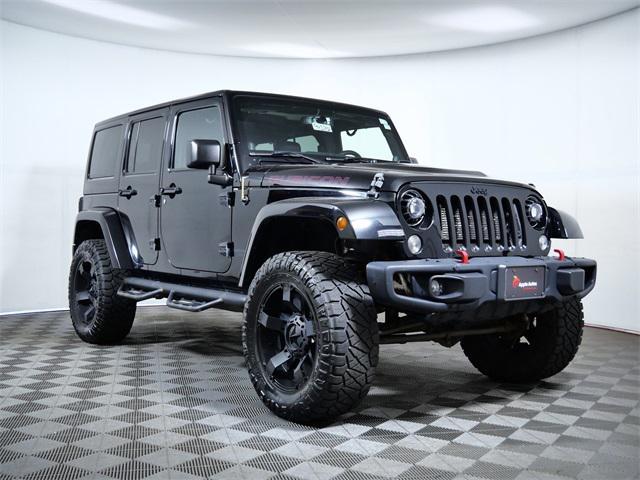 used 2014 Jeep Wrangler Unlimited car, priced at $17,599