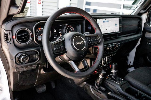 used 2024 Jeep Wrangler car, priced at $43,040