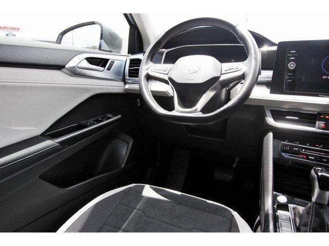 used 2025 Volkswagen Taos car, priced at $24,454