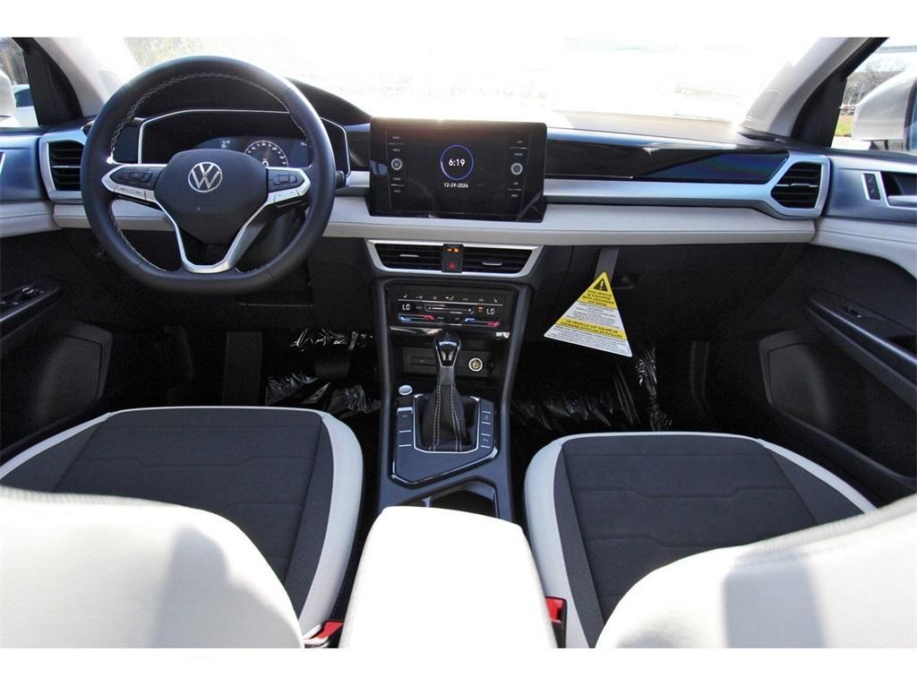 used 2025 Volkswagen Taos car, priced at $24,201