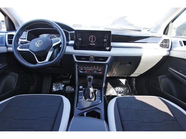 used 2025 Volkswagen Taos car, priced at $24,453