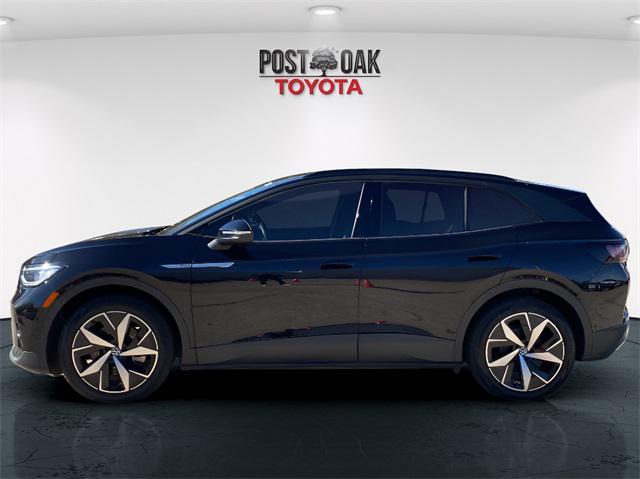 used 2023 Volkswagen ID.4 car, priced at $20,125
