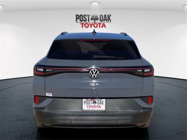 used 2023 Volkswagen ID.4 car, priced at $20,829