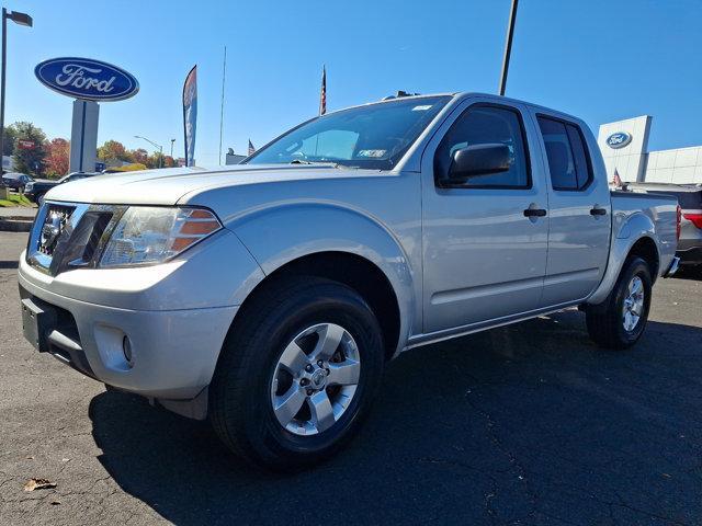 used 2013 Nissan Frontier car, priced at $15,500