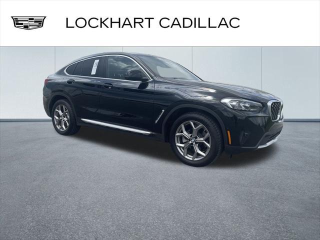 used 2022 BMW X4 car, priced at $34,000