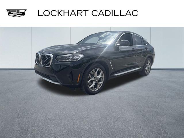 used 2022 BMW X4 car, priced at $34,000