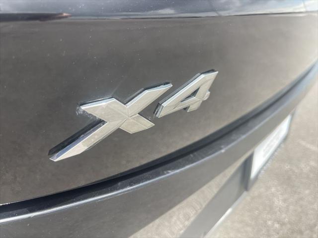 used 2022 BMW X4 car, priced at $34,000