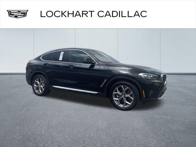 used 2022 BMW X4 car, priced at $34,000