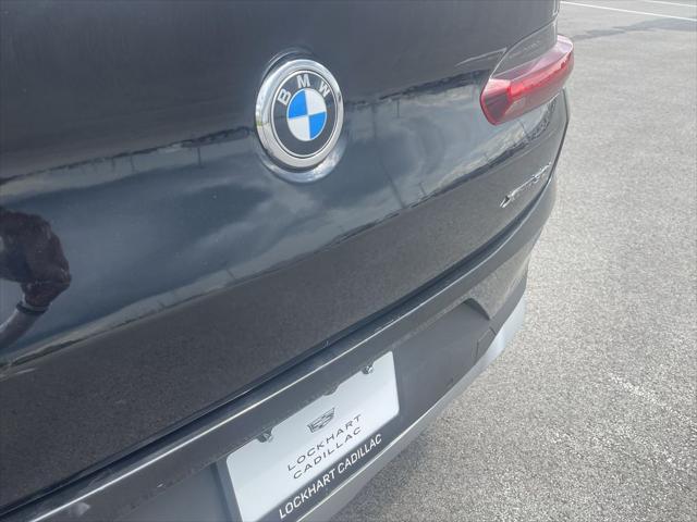 used 2022 BMW X4 car, priced at $34,000