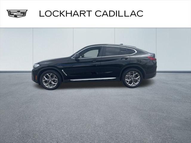 used 2022 BMW X4 car, priced at $34,000