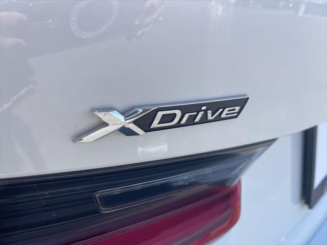 used 2024 BMW 330e car, priced at $30,966