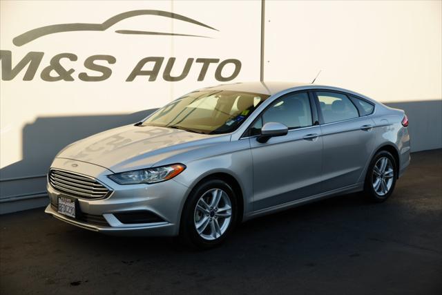 used 2018 Ford Fusion car, priced at $14,120