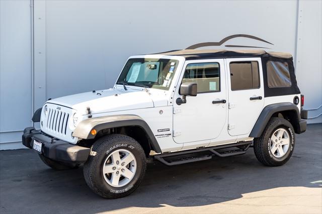 used 2018 Jeep Wrangler JK Unlimited car, priced at $22,088