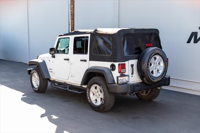 used 2018 Jeep Wrangler JK Unlimited car, priced at $22,088