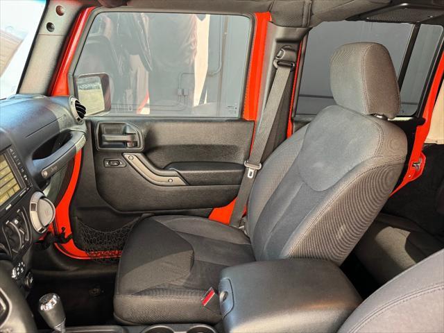 used 2015 Jeep Wrangler Unlimited car, priced at $19,298