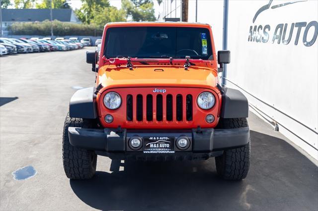 used 2015 Jeep Wrangler Unlimited car, priced at $19,298