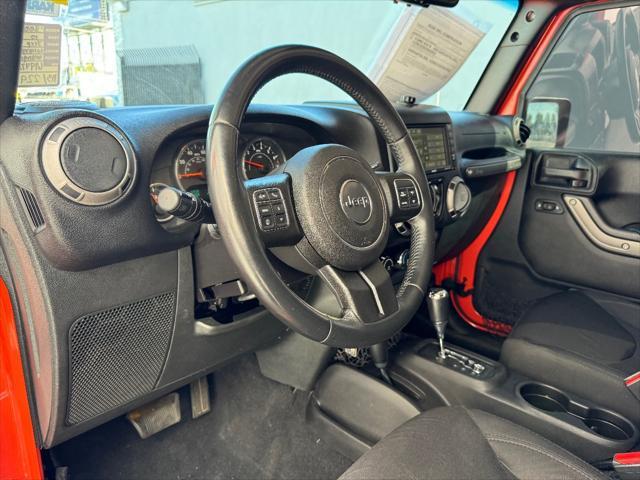 used 2015 Jeep Wrangler Unlimited car, priced at $19,298