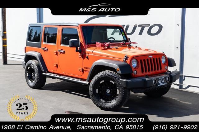 used 2015 Jeep Wrangler Unlimited car, priced at $19,298