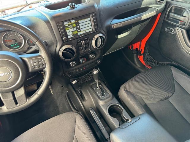 used 2015 Jeep Wrangler Unlimited car, priced at $19,298