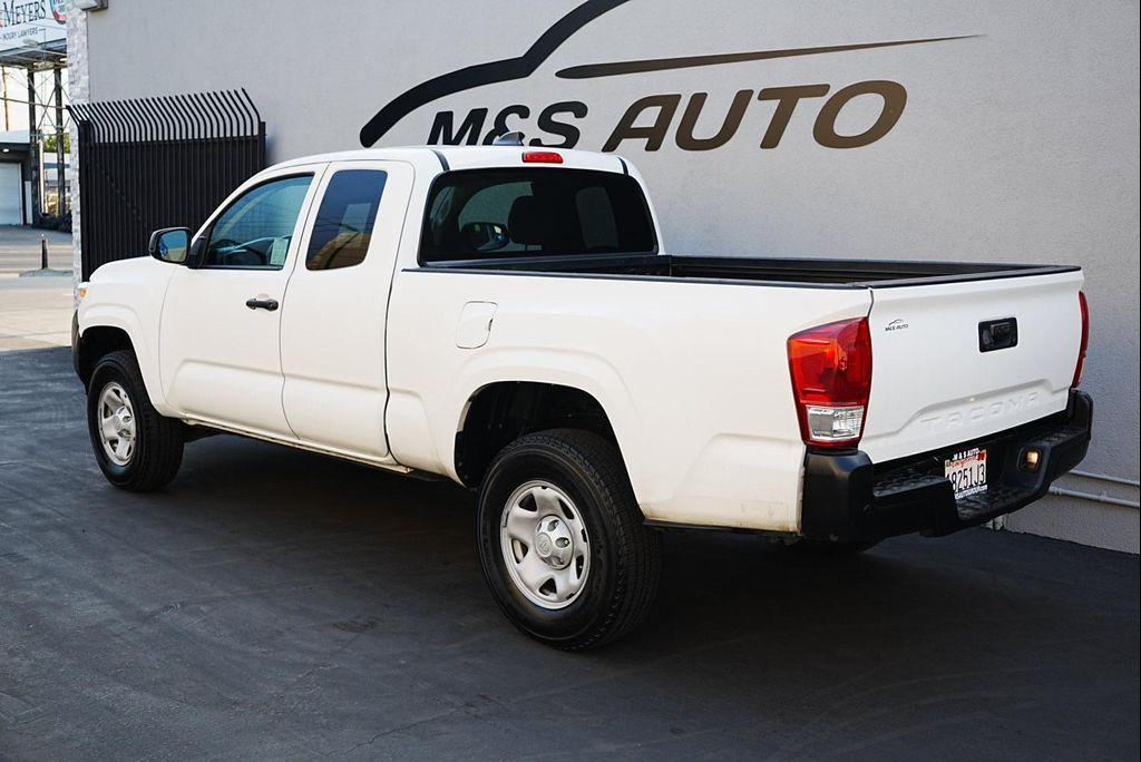 used 2021 Toyota Tacoma car, priced at $24,121