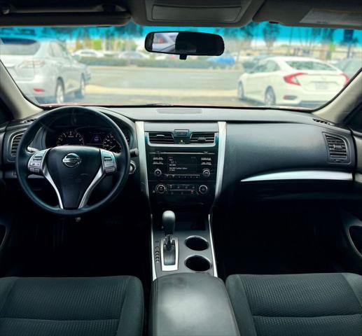 used 2015 Nissan Altima car, priced at $9,995