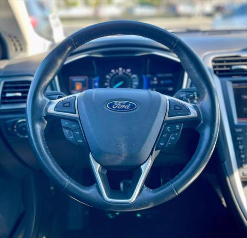 used 2016 Ford Fusion car, priced at $10,495