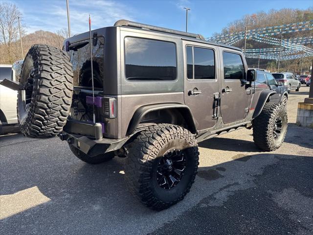 used 2016 Jeep Wrangler Unlimited car, priced at $23,900