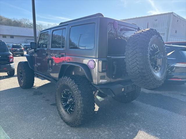 used 2016 Jeep Wrangler Unlimited car, priced at $23,900