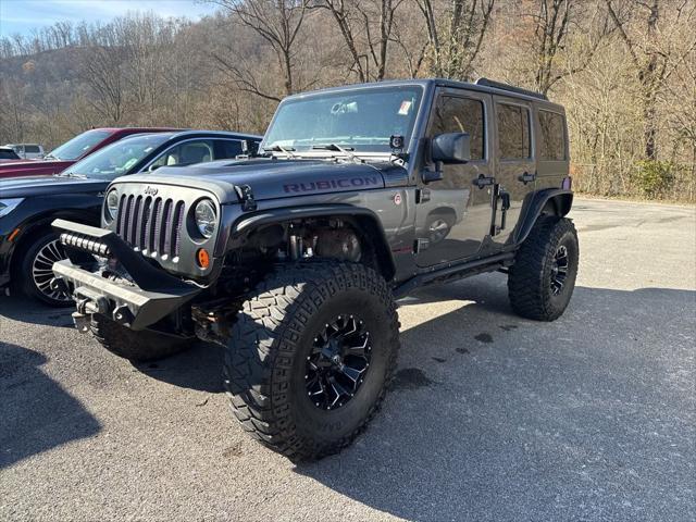 used 2016 Jeep Wrangler Unlimited car, priced at $23,900