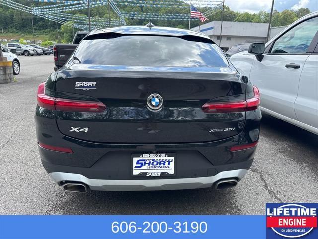 used 2024 BMW X4 car, priced at $45,000