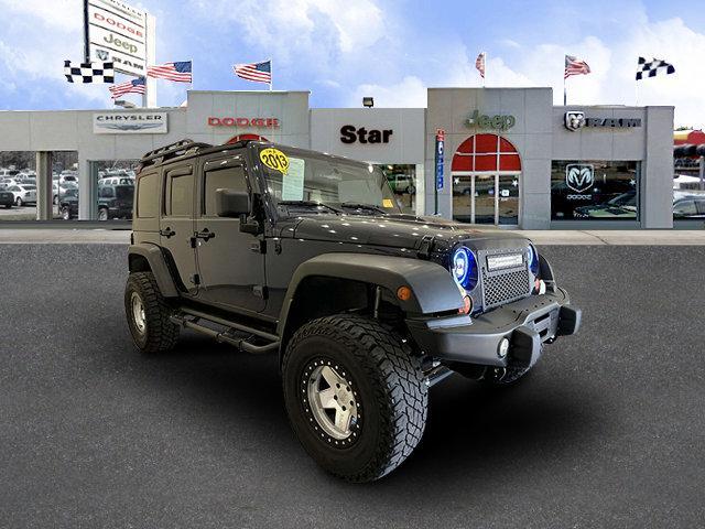 used 2013 Jeep Wrangler Unlimited car, priced at $18,988