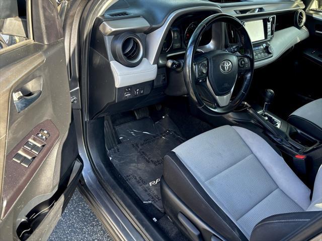 used 2018 Toyota RAV4 Hybrid car, priced at $18,990