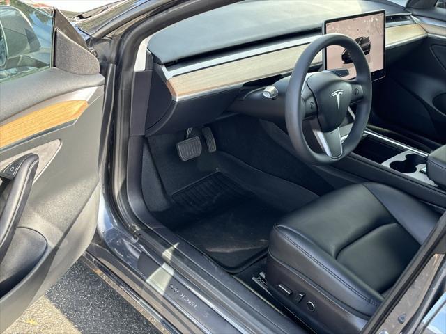 used 2023 Tesla Model 3 car, priced at $24,878