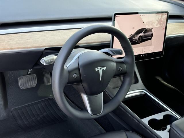 used 2023 Tesla Model 3 car, priced at $24,878