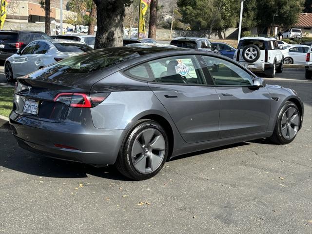 used 2023 Tesla Model 3 car, priced at $24,878