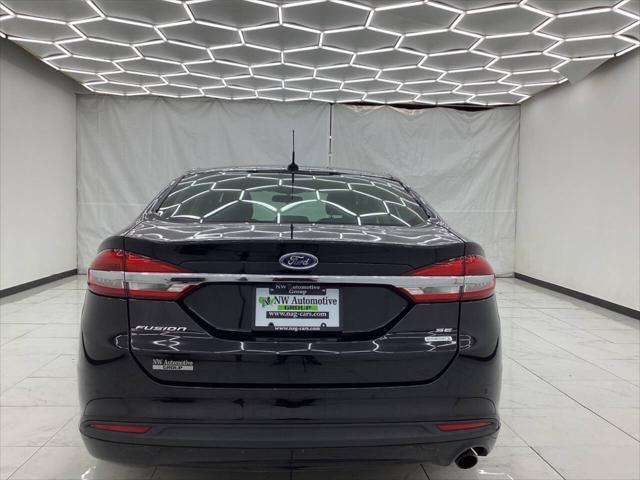 used 2018 Ford Fusion car, priced at $9,993