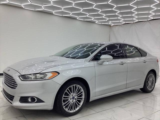 used 2014 Ford Fusion car, priced at $5,993