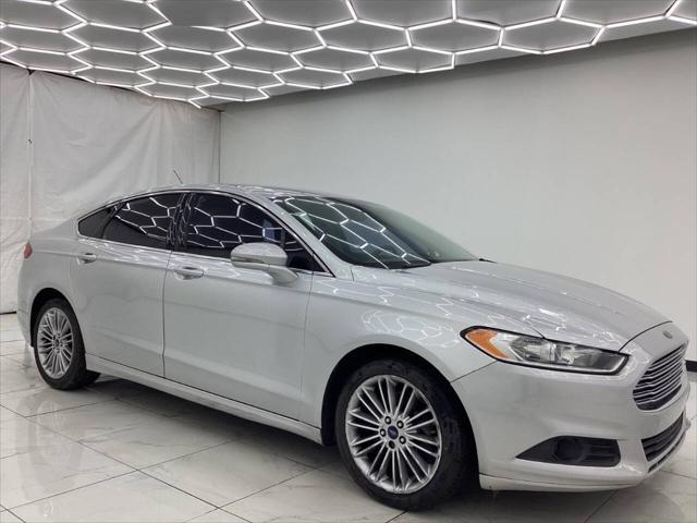 used 2014 Ford Fusion car, priced at $5,993