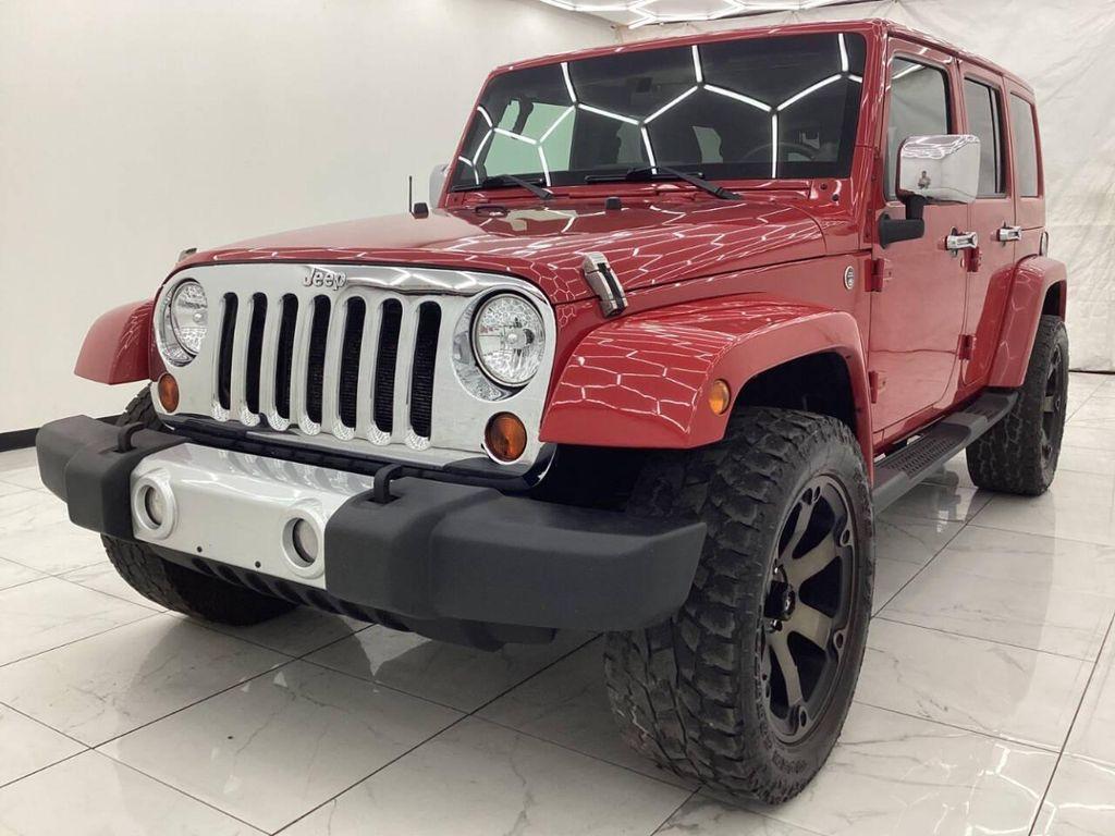 used 2011 Jeep Wrangler Unlimited car, priced at $13,993