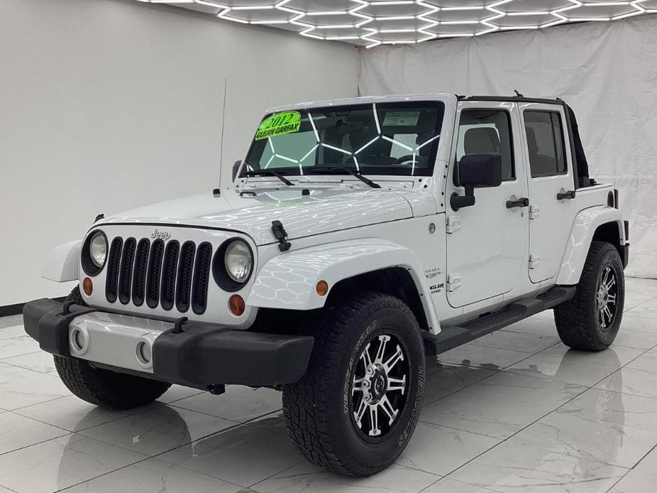 used 2012 Jeep Wrangler Unlimited car, priced at $16,993