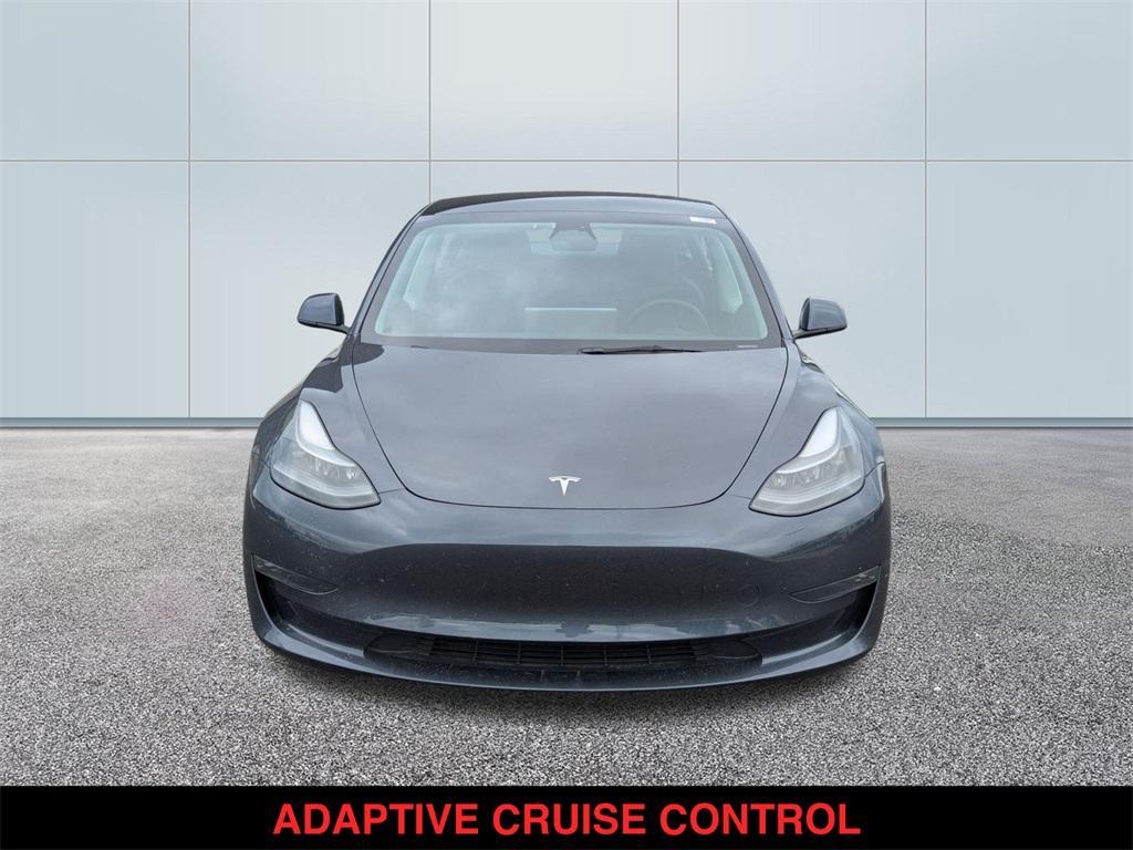 used 2023 Tesla Model 3 car, priced at $30,000