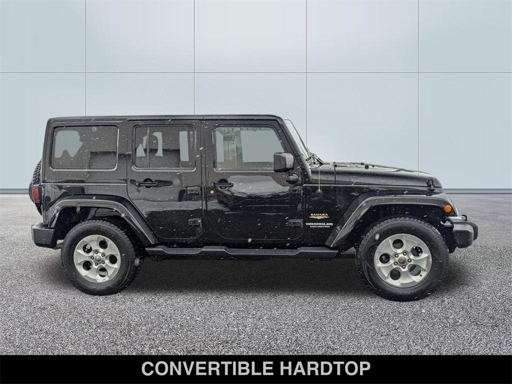 used 2015 Jeep Wrangler Unlimited car, priced at $13,641