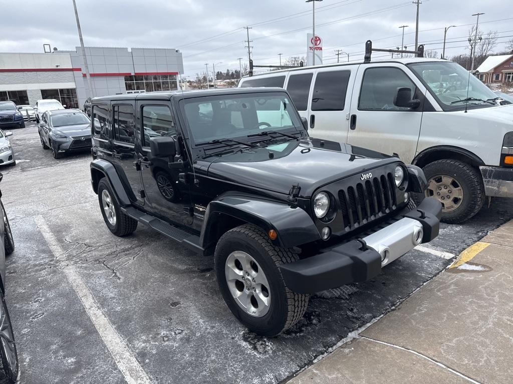 used 2015 Jeep Wrangler Unlimited car, priced at $14,929