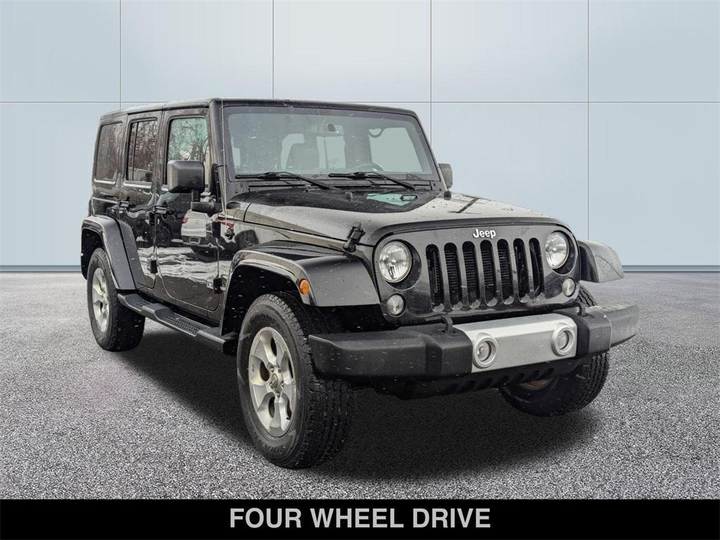 used 2015 Jeep Wrangler Unlimited car, priced at $13,641